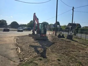 Car Park with a digger working on laying a new surface